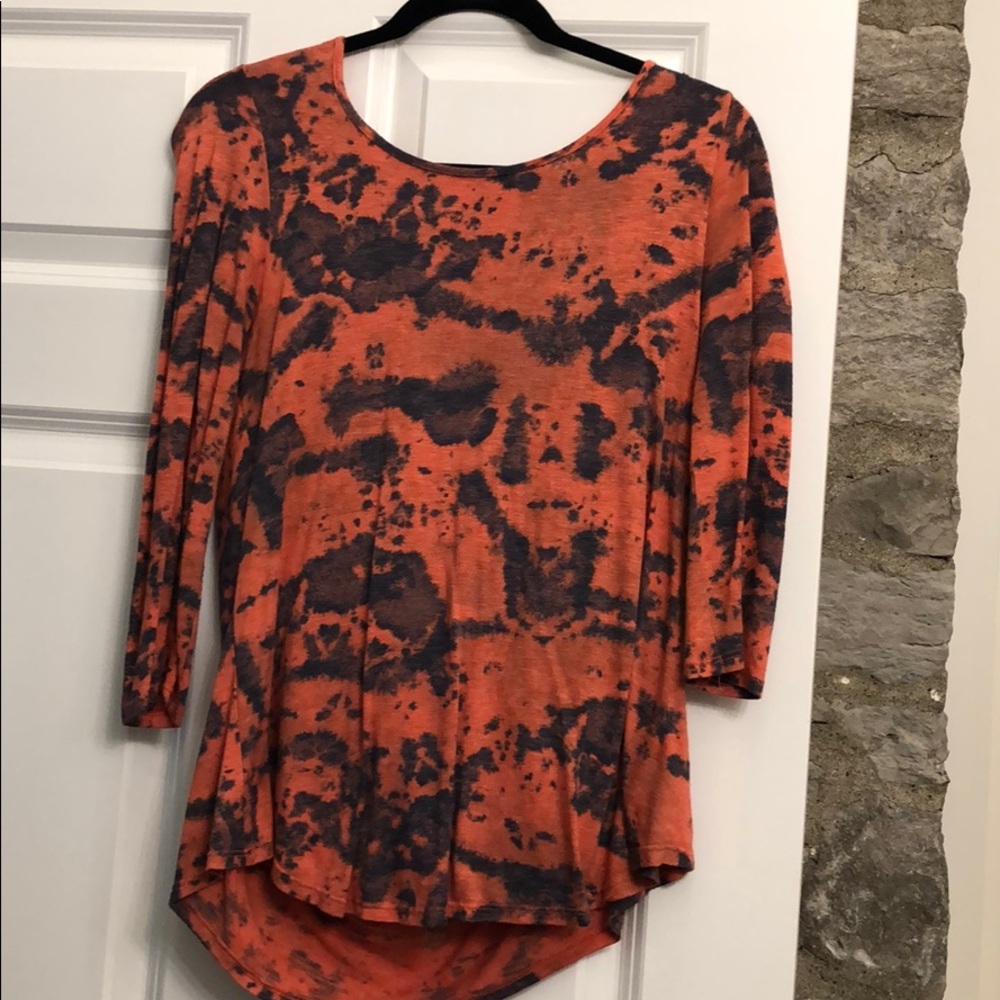 Plume and thread top